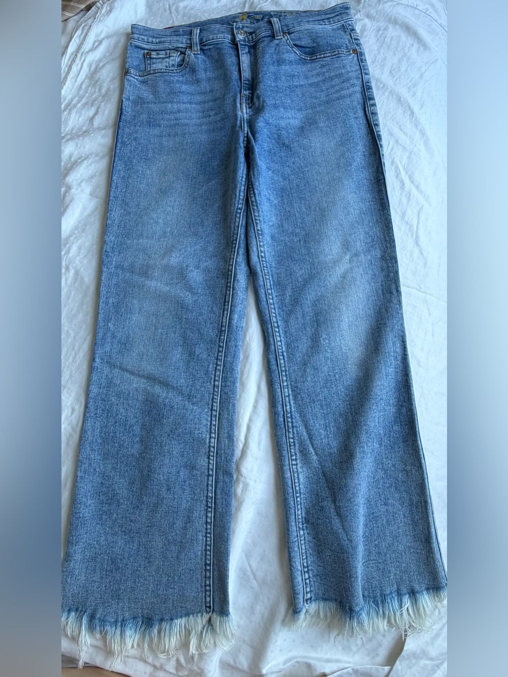 7 For All Mankind Light Blue Flare Jeans with Frayed Hem